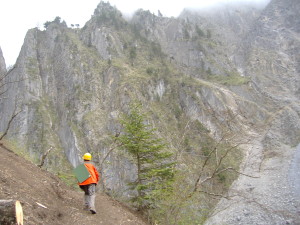 Chinese geologist mapping Snow Mountains Sichuan Province PRC